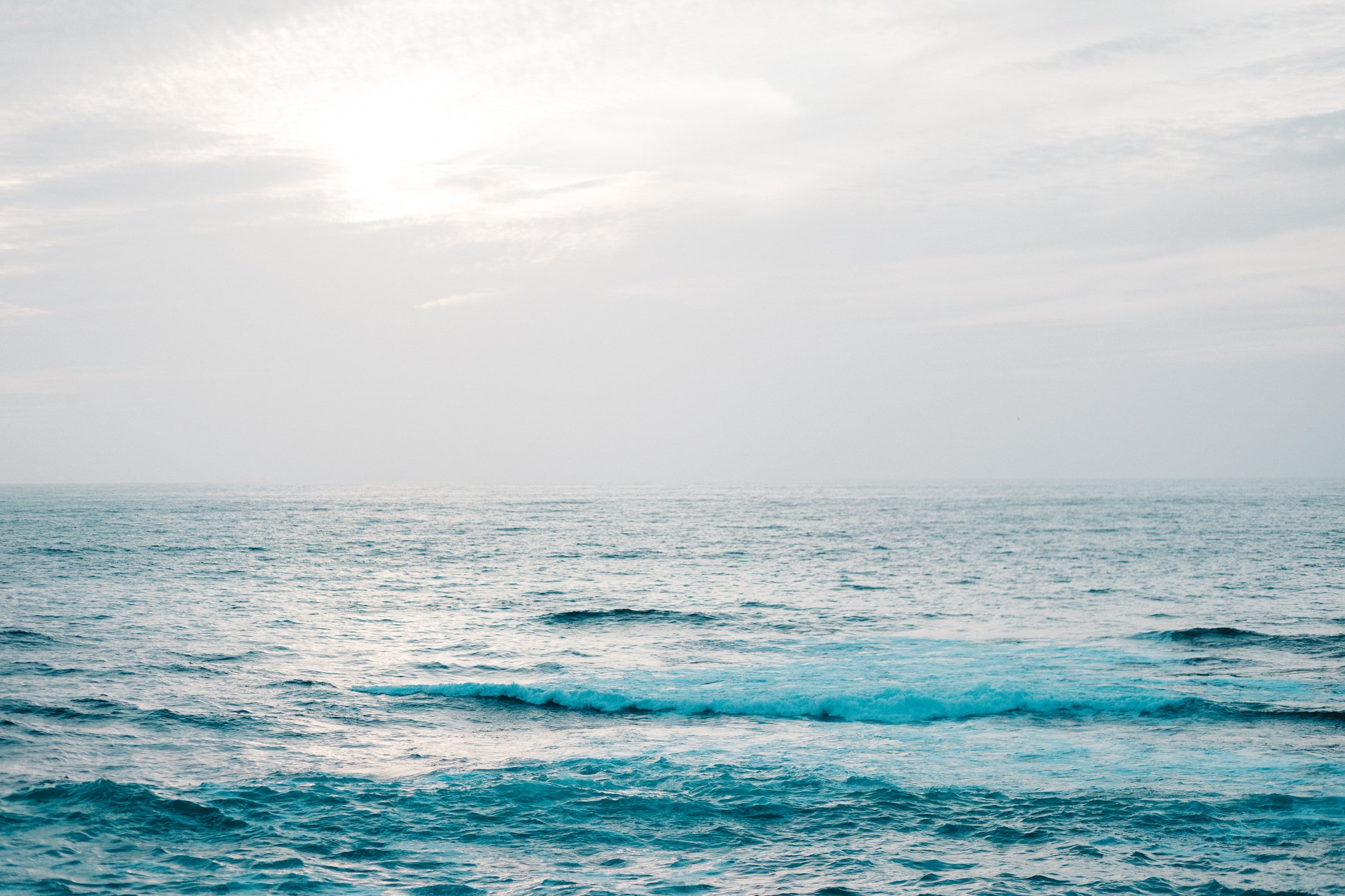 Seascape Scenery under White Sky